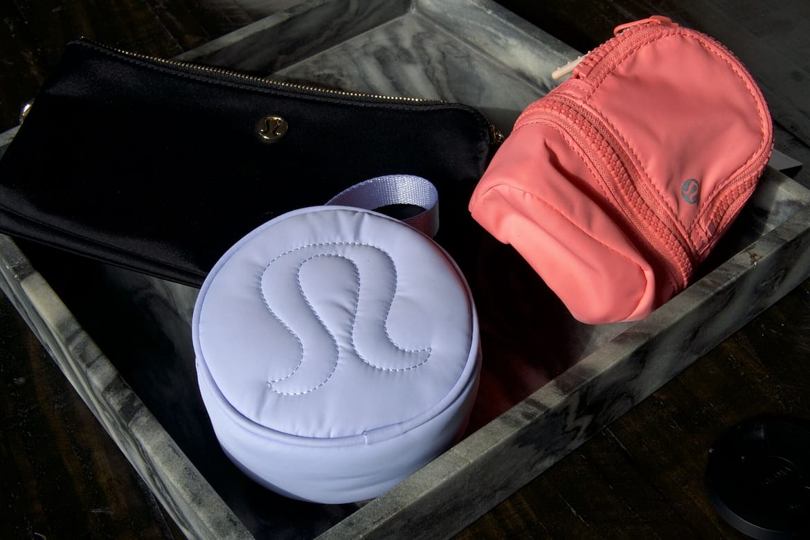 5 reasons why you should get a lululemon wallet - lululemon true identity card holder, now and always pouch, lululemon logo pouch, city adventurer backpack nano