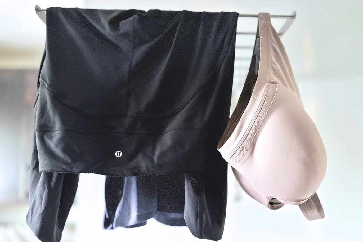 Lululemon leggings and sports bra hanging to dry - LEGGINGS STILL SMELL? HOW TO REMOVE SWEAT ODOR FOR GOOD