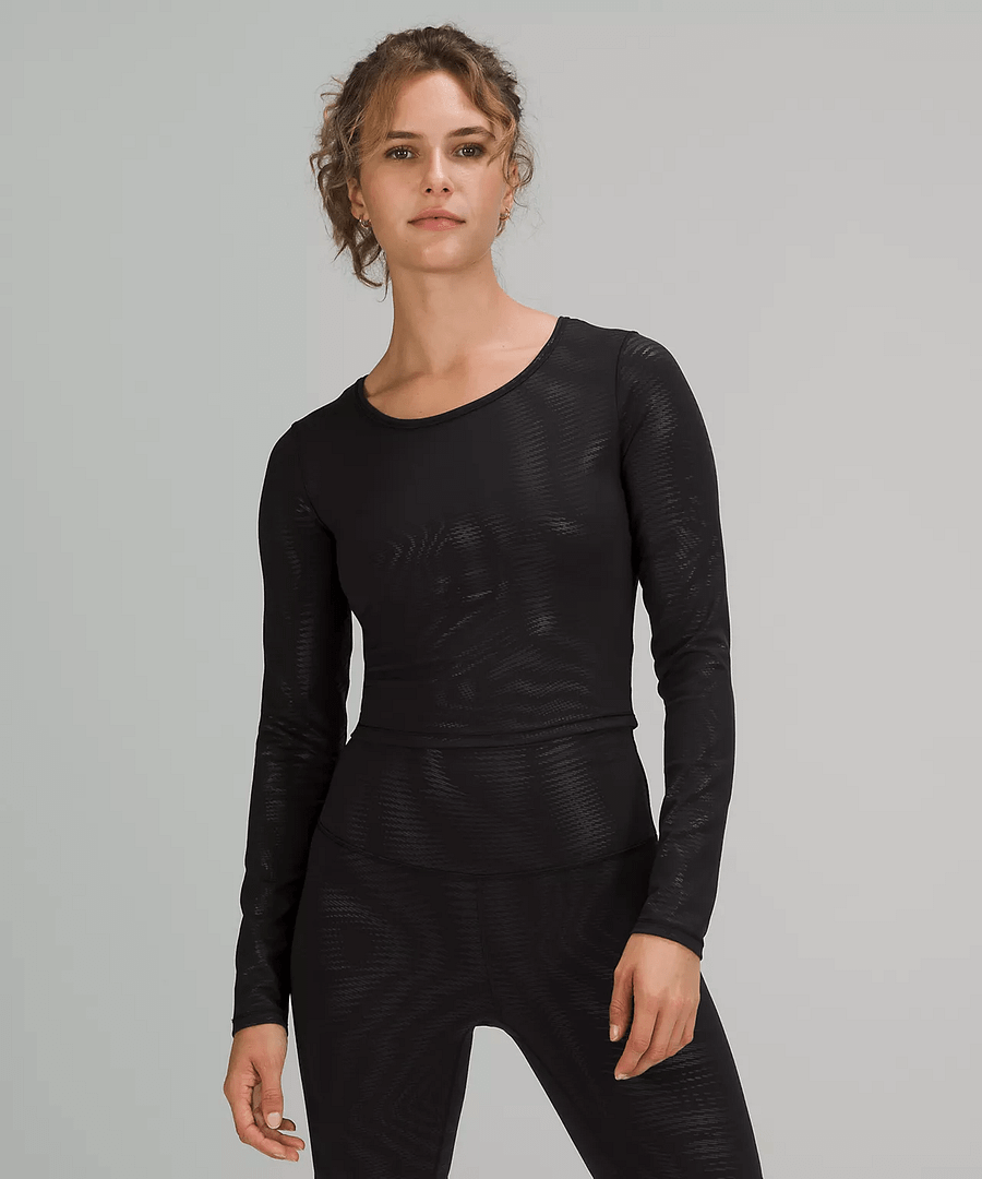 lululemon upload woman wearing Wunder Train Cropped Long Sleeve Shirt Foil