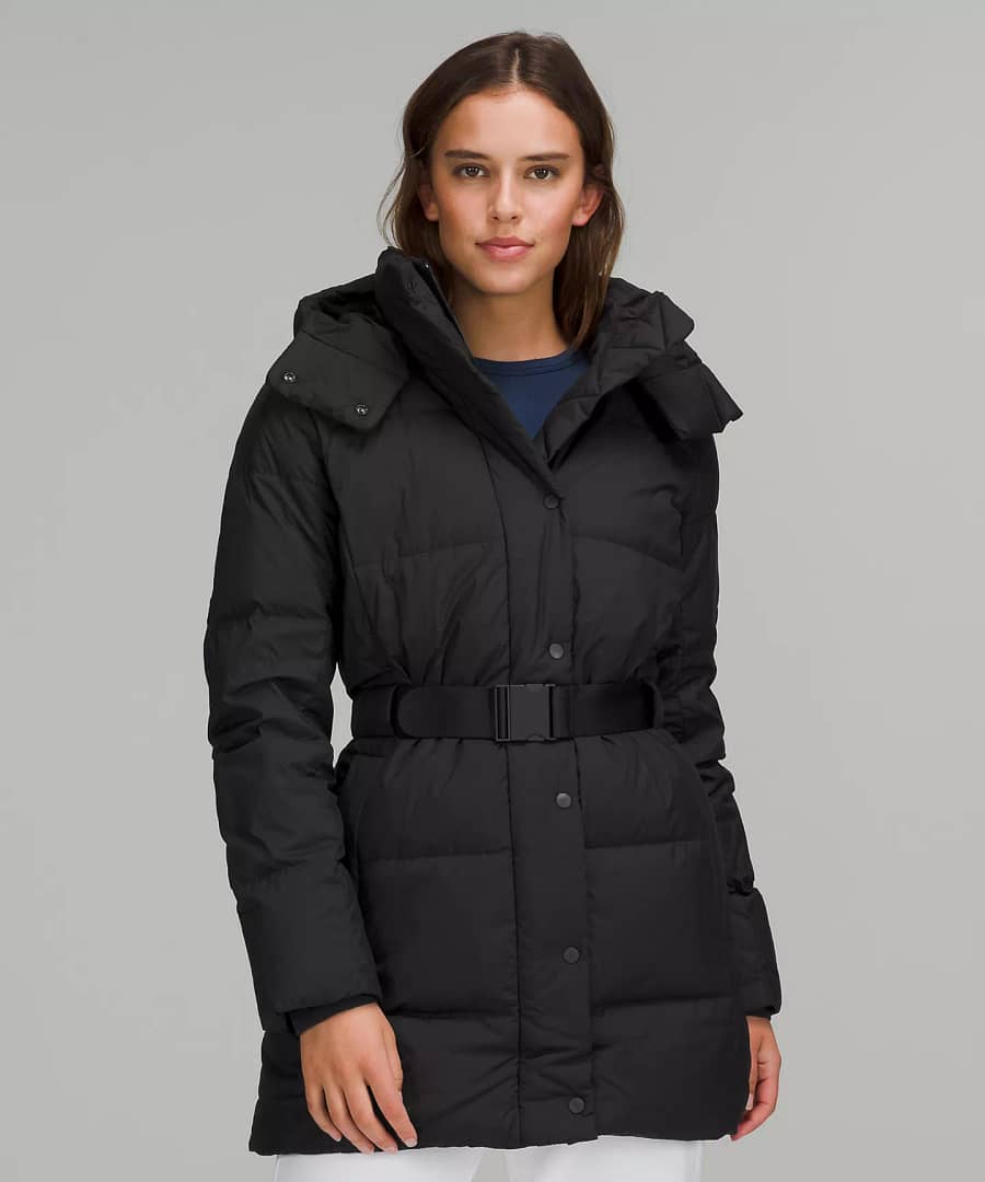 woman wearing black Wunder Puff Waist Jacket from lululemon Restocks