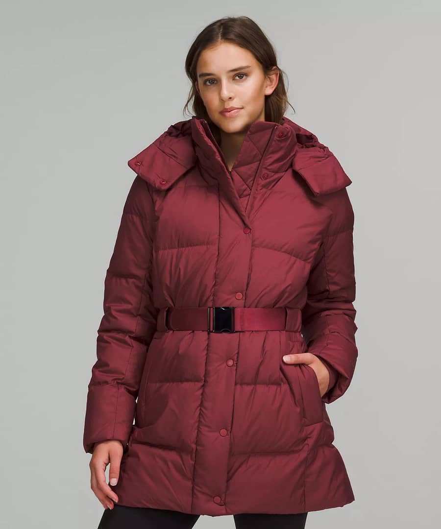 woman wearing maroon Wunder Puff Waist Jacket from lululemon Restocks