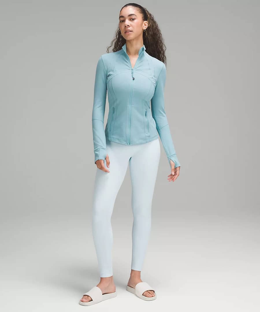 woman wearing Define Jacket Luon - tidal teal and white leggings for lululemon upload