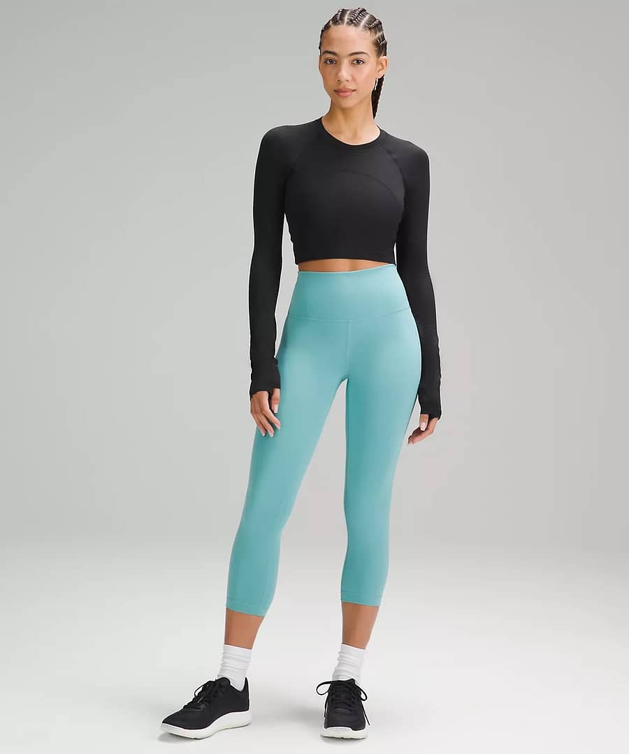 woman wearing Swiftly Tech Cropped Long-Sleeve Shirt 2.0 for lululemon upload