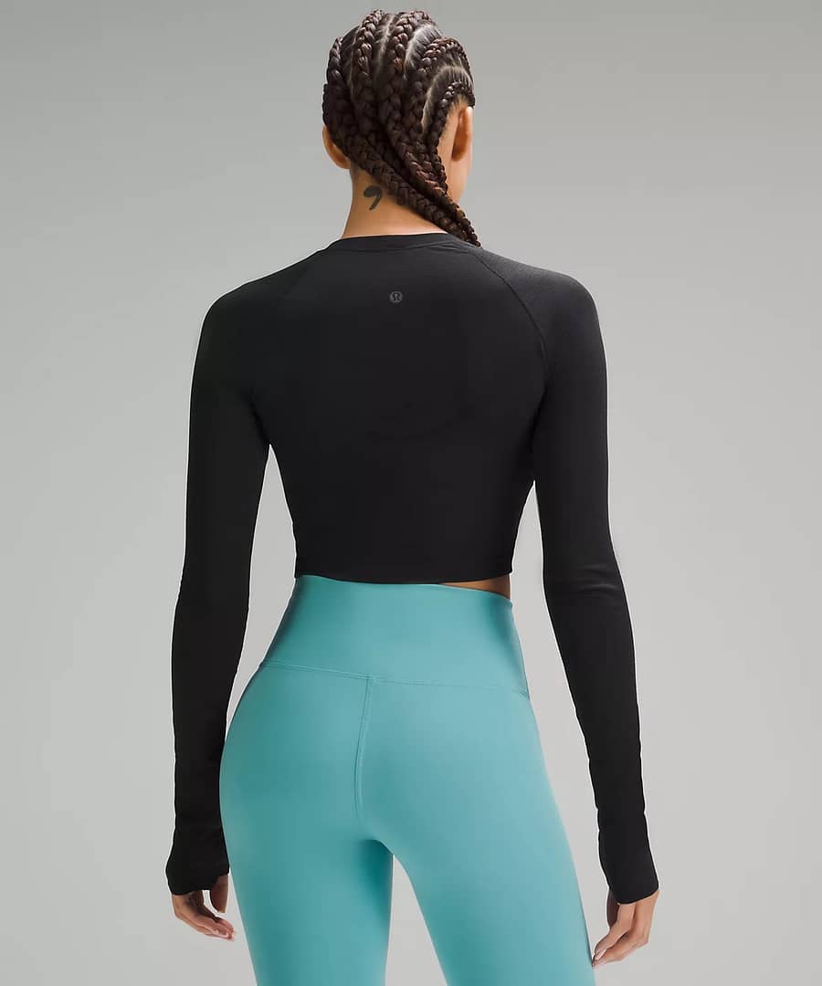 woman wearing back details of Swiftly Tech Cropped Long-Sleeve Shirt 2.0 for lululemon upload