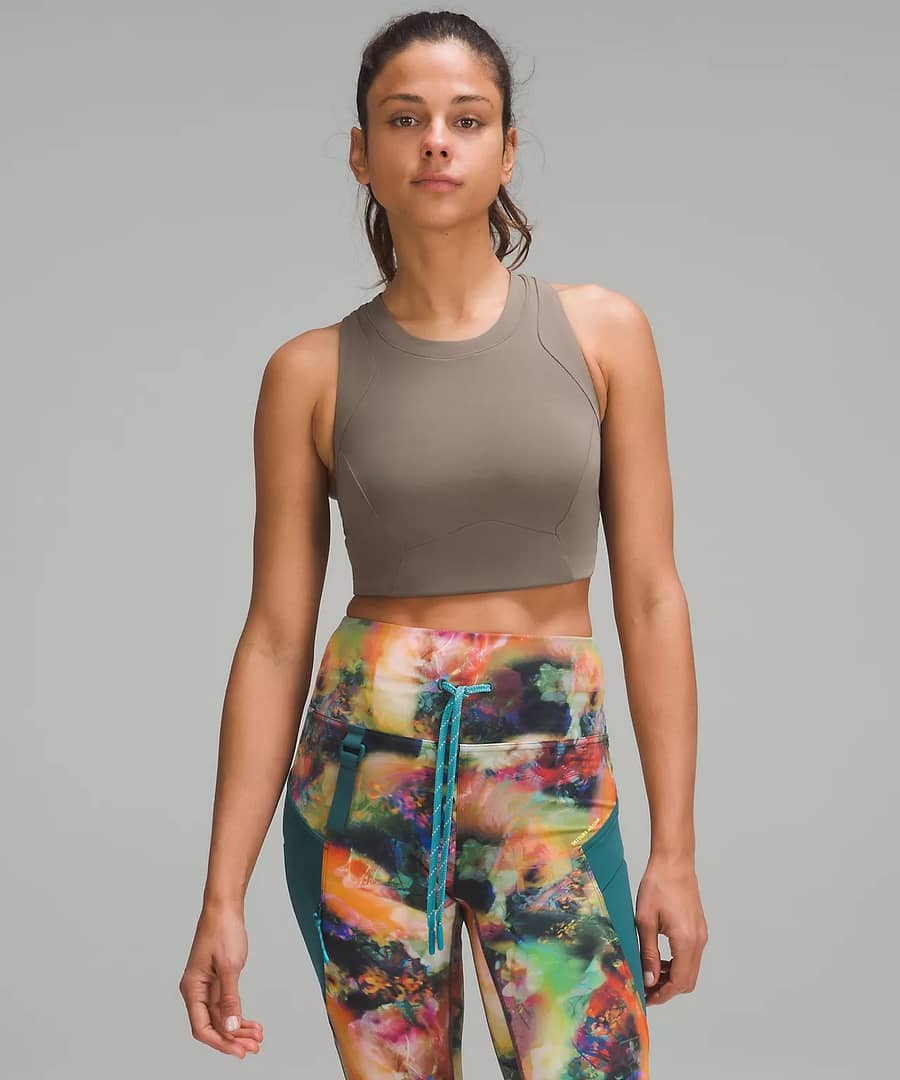 woman in Storage Hike Bra and floral leggings from lululemon Restocks