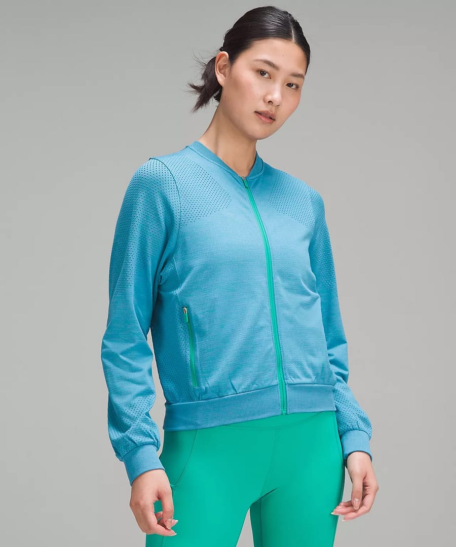 woman wearing the Swiftly Midweight Full Zip from the lululemon x Madhappy Collab