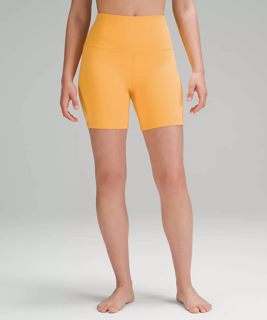 woman in lululemon Align High-Rise Short in yellow best to pair with the lululemon define jacket