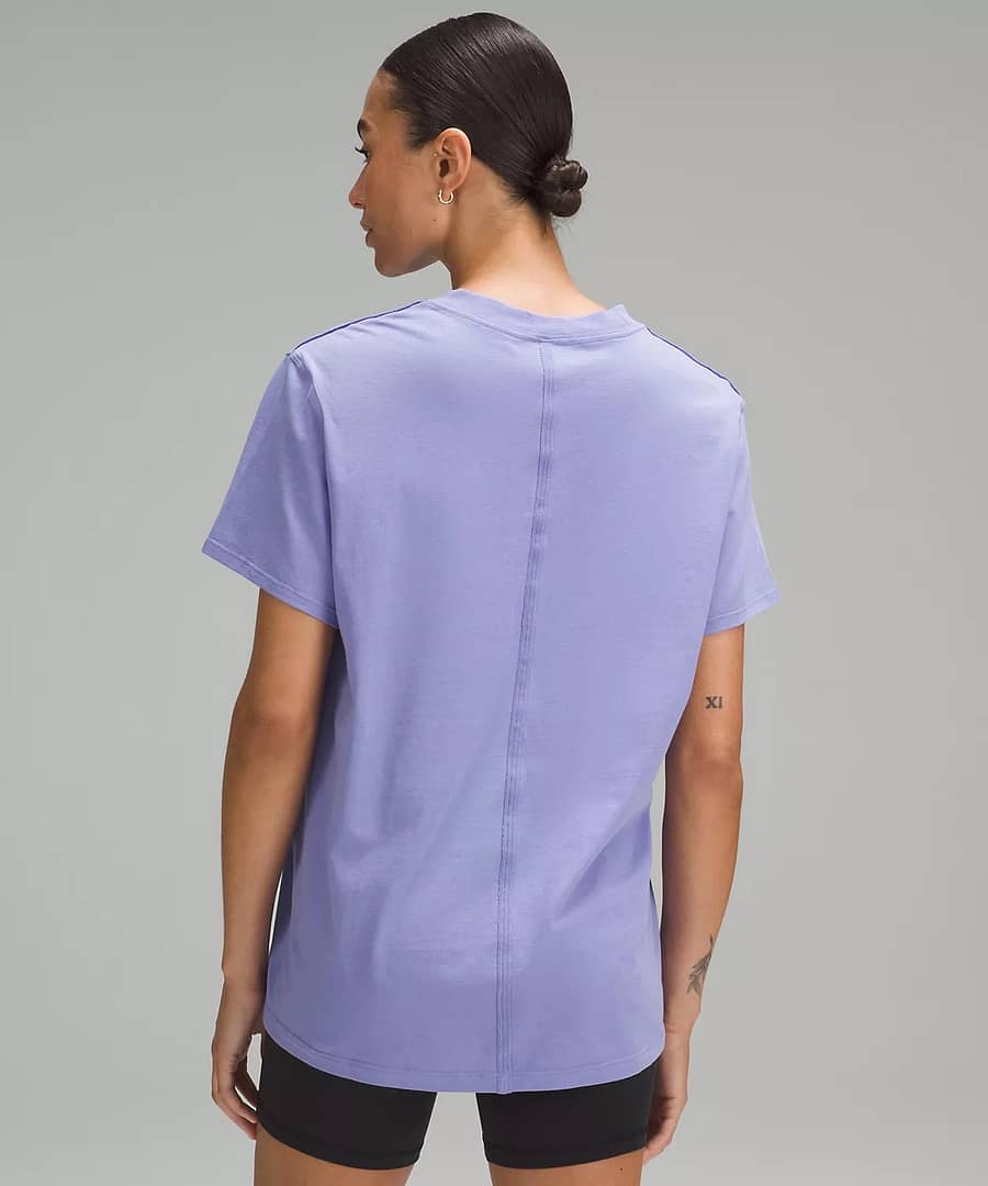 back details of woman All Yours Cotton T-Shirt - dark lavender and black cycling shorts for Lululemon weekly product drop