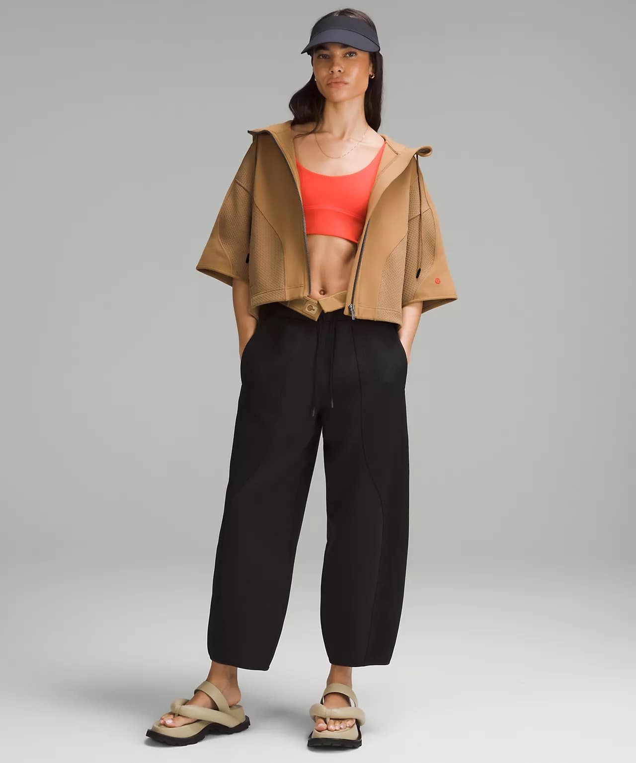 woman in Mixed Fabric Full-Zip Hoodie and black pants to pair with Scuba Oversized Half-Zip Hoodie