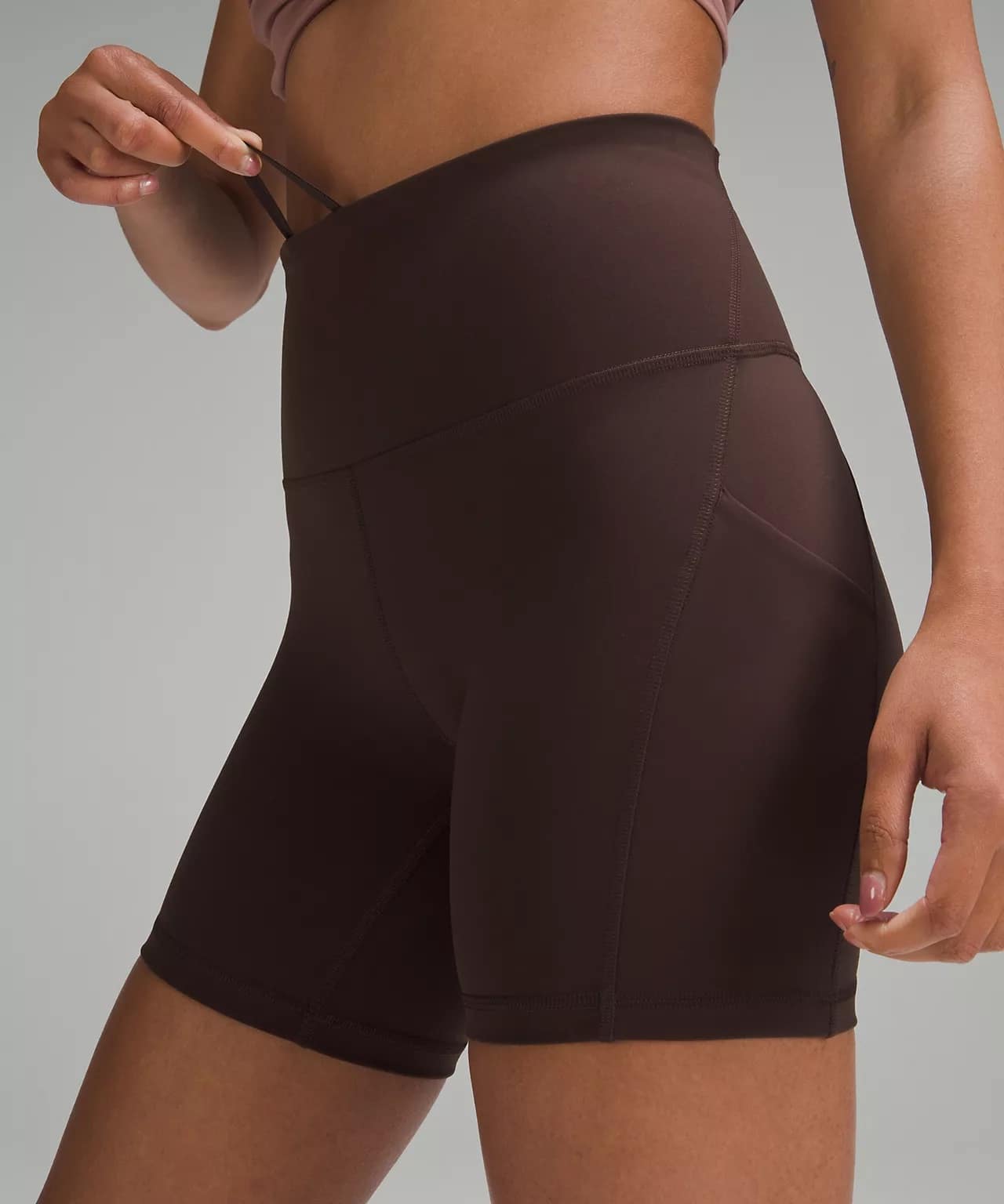 side details of Wunder Train High-Rise lululemon Short with Pockets 6" espresso